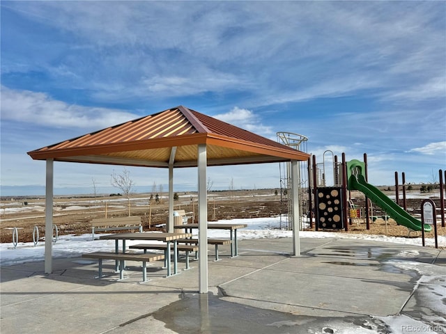 surrounding community with playground community and a gazebo