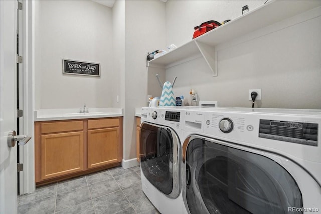19409 W 88th Dr, Arvada, CO 80007 - laundry room featuring washer and clothes dryer and cabinet space