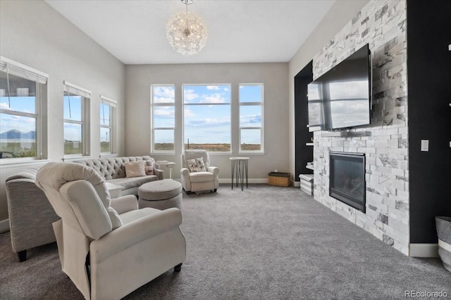 19409 W 88th Dr, Arvada, CO 80007 - living room featuring a fireplace, carpet, and baseboards