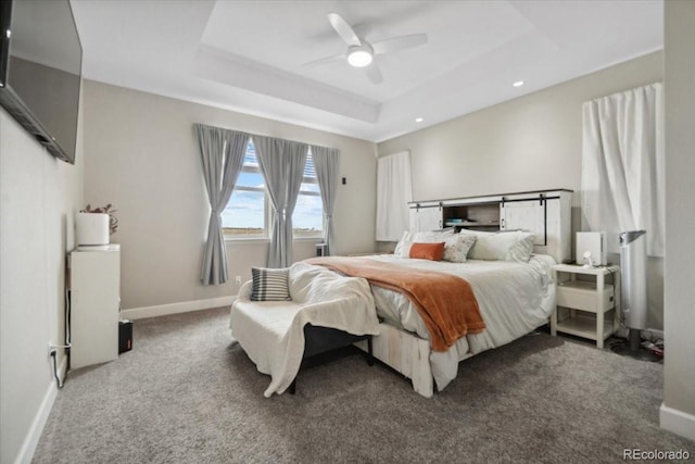 19409 W 88th Dr, Arvada, CO 80007 - carpeted bedroom featuring a raised ceiling, baseboards, ceiling fan, and recessed lighting