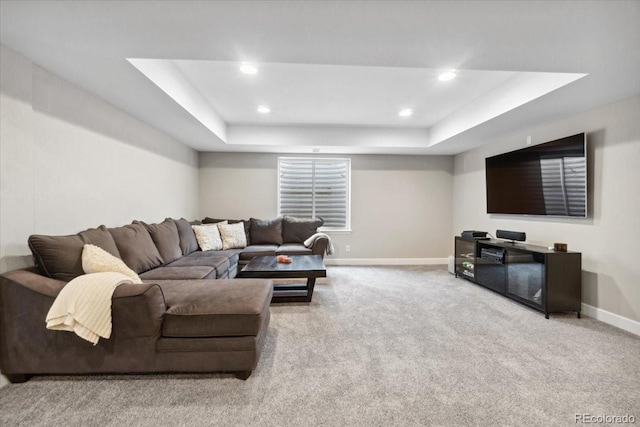 19409 W 88th Dr, Arvada, CO 80007 - living room featuring a raised ceiling, baseboards, carpet, and recessed lighting