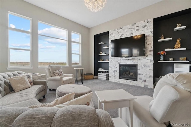 19409 W 88th Dr, Arvada, CO 80007 - living room featuring built in shelves, carpet flooring, and a fireplace