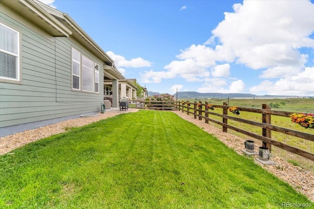19409 W 88th Dr, Arvada, CO 80007 - view of yard with a mountain view