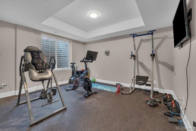 19409 W 88th Dr, Arvada, CO 80007 - workout area with baseboards and a tray ceiling