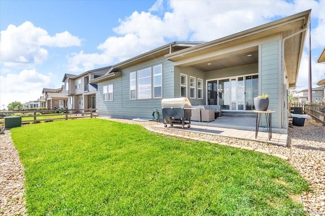 19409 W 88th Dr, Arvada, CO 80007 - back of property with a patio area