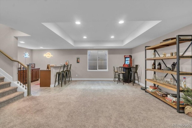 19409 W 88th Dr, Arvada, CO 80007 - game room featuring light carpet, a tray ceiling, recessed lighting, and a bar
