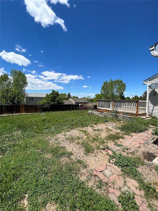 view of yard with a deck