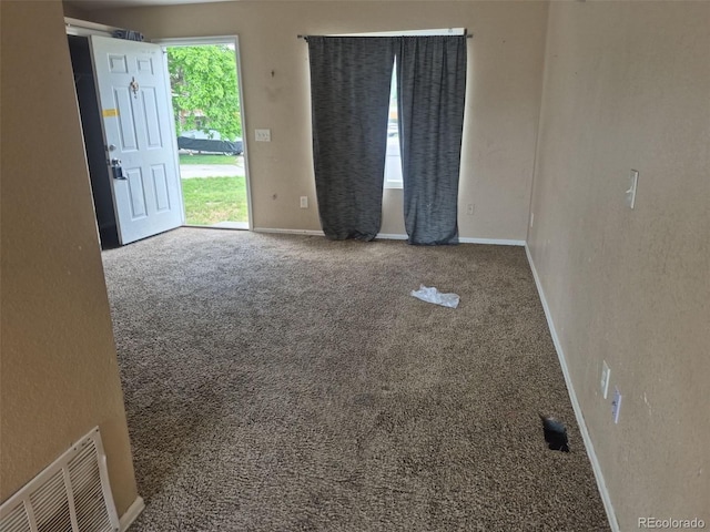 1415 S Pitkin Ct, Aurora, CO 80017 - spare room featuring carpet floors and baseboards