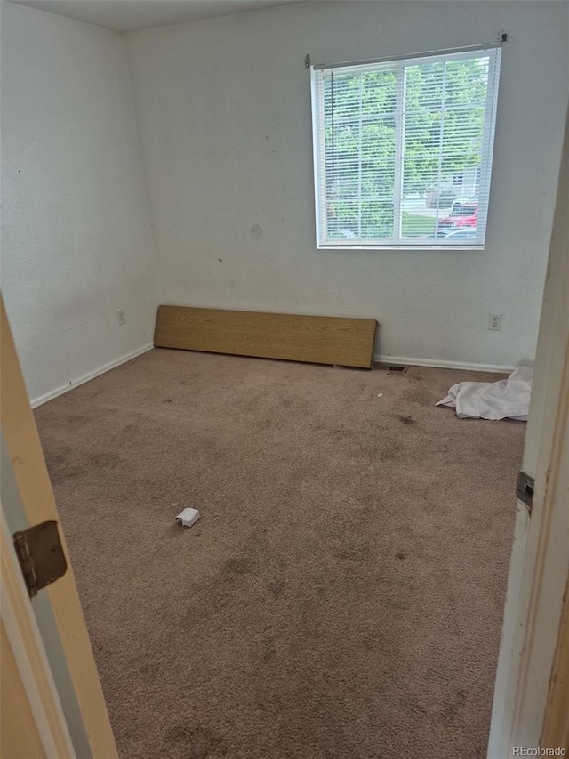 1415 S Pitkin Ct, Aurora, CO 80017 - empty room featuring carpet flooring and baseboards