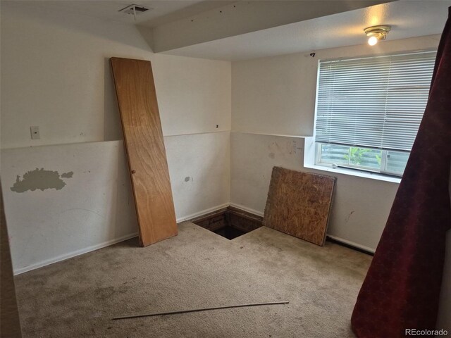 1415 S Pitkin Ct, Aurora, CO 80017 - spare room with carpet