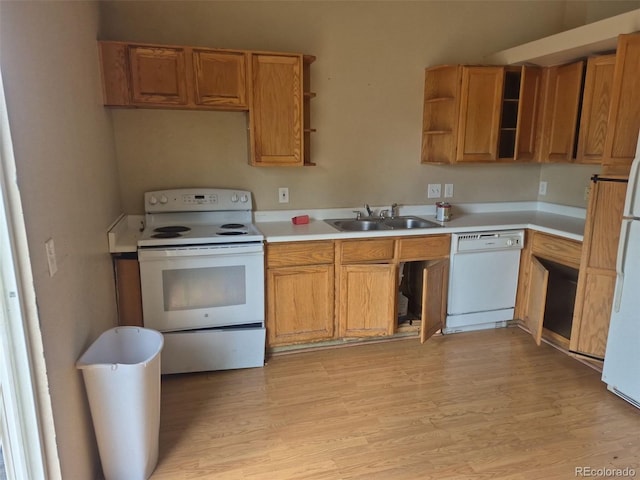 1415 S Pitkin Ct, Aurora, CO 80017 - kitchen with white appliances, a sink, open shelves, light wood-type flooring, and light countertops
