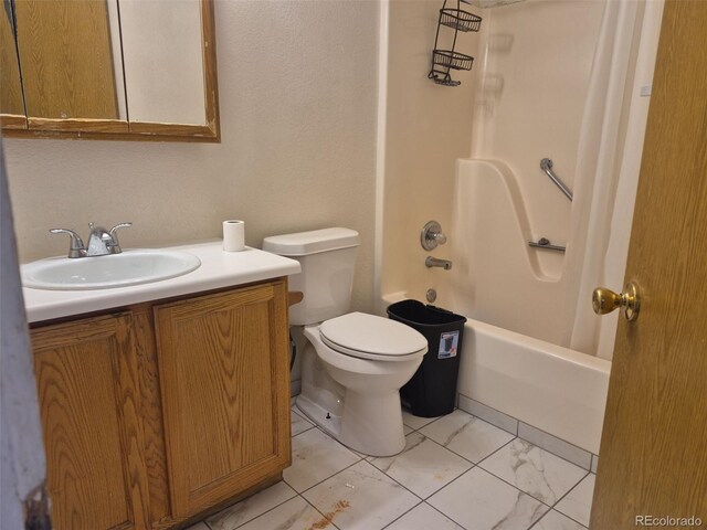 1415 S Pitkin Ct, Aurora, CO 80017 - full bath featuring vanity, toilet, shower / bathtub combination, and marble look tile flooring