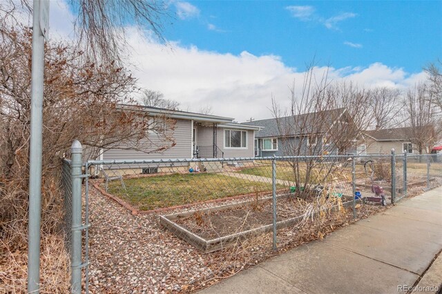 117 6th St, Frederick, CO 80530 - view of front of property featuring a garden