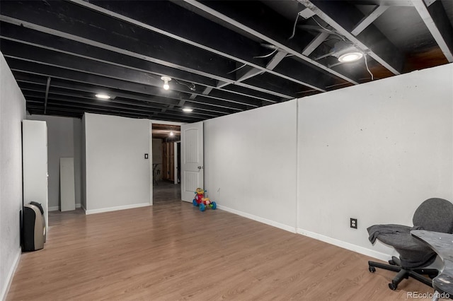 117 6th St, Frederick, CO 80530 - finished basement with light wood finished floors and baseboards