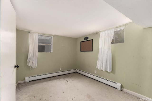 117 6th St, Frederick, CO 80530 - spare room featuring baseboards and a baseboard radiator