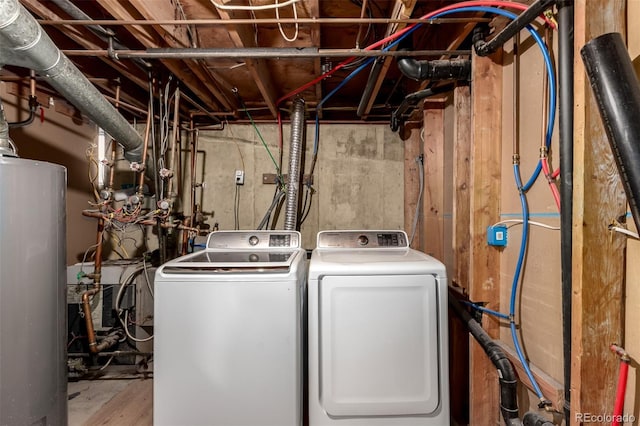 117 6th St, Frederick, CO 80530 - washroom featuring water heater and separate washer and dryer