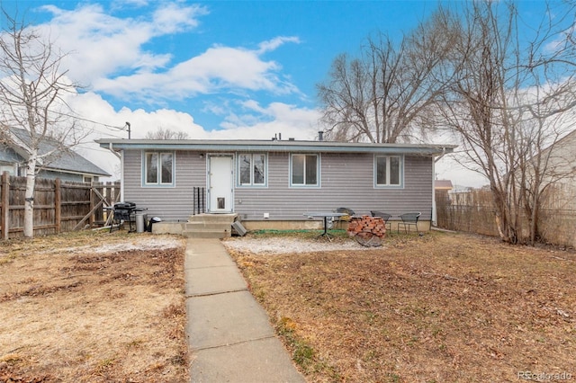 117 6th St, Frederick, CO 80530 - view of front of house with a fenced backyard
