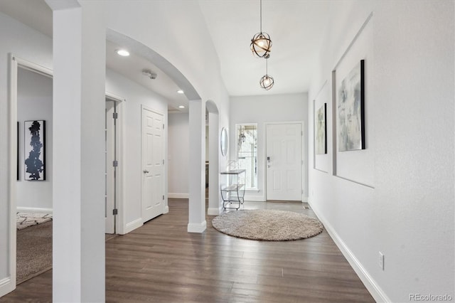 foyer with dark hardwood / wood-style flooring