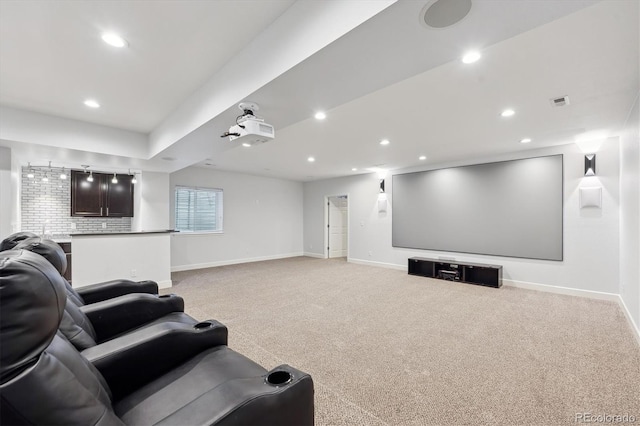 home theater room with light carpet