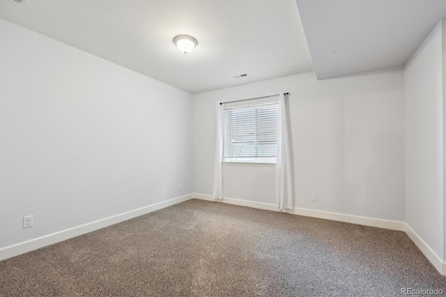 spare room with carpet flooring