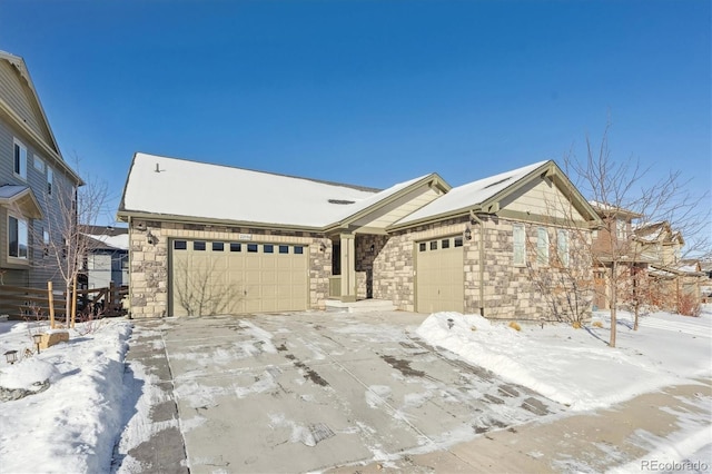 ranch-style home featuring a garage