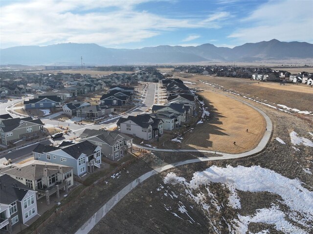 drone / aerial view featuring a mountain view and a residential view