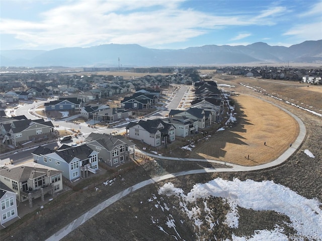 aerial view featuring a mountain view and a residential view