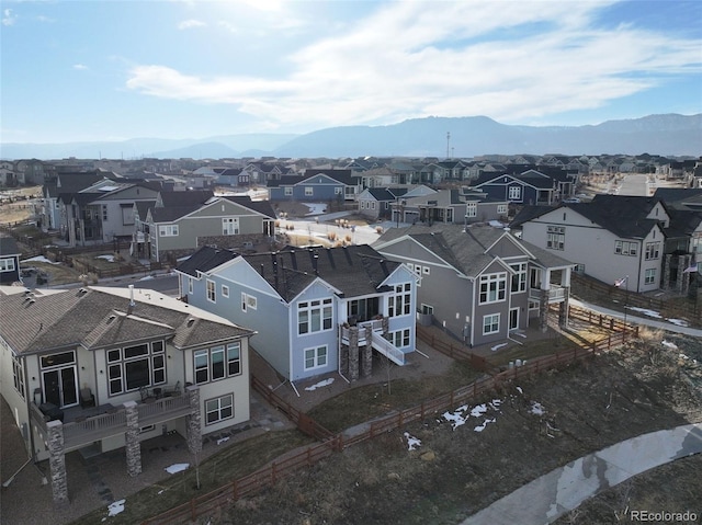 birds eye view of property featuring a mountain view and a residential view