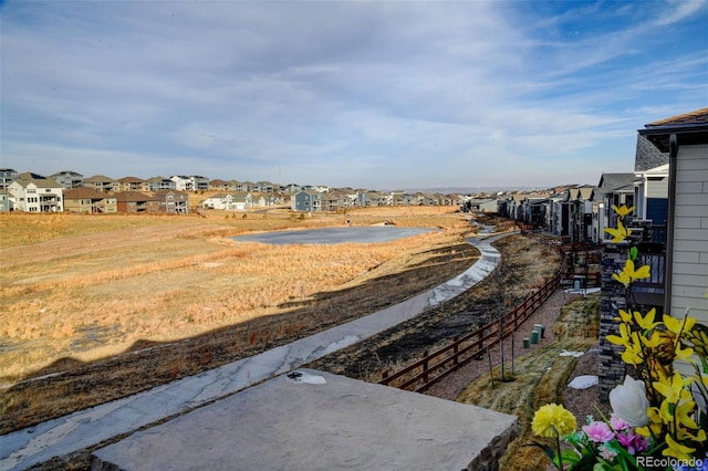 view of yard featuring a residential view