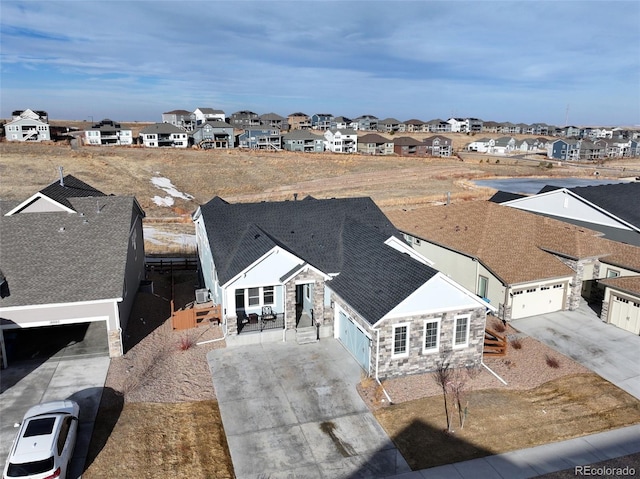 drone / aerial view featuring a residential view