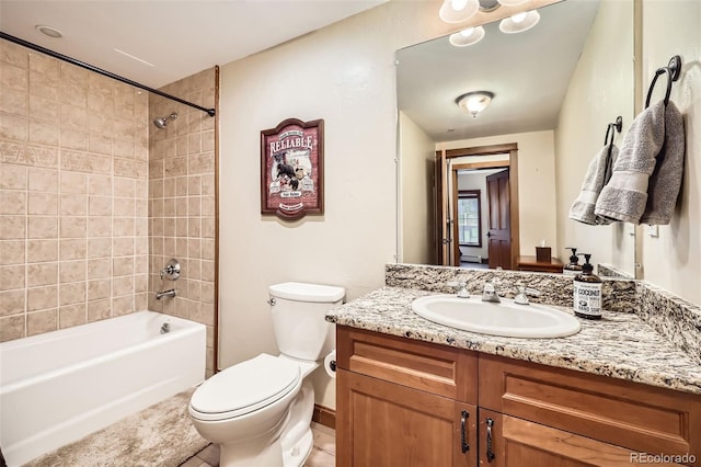 22787 US Highway 6 Unit 313, Dillon, CO 80435 - full bath with vanity, toilet, bathtub / shower combination, baseboards, and tile patterned flooring