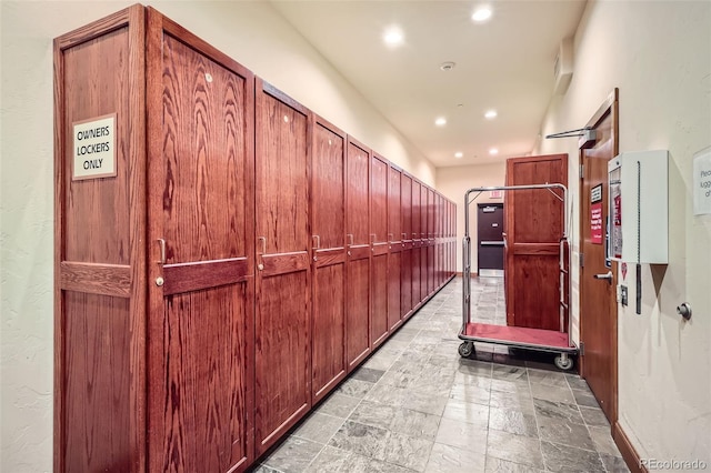 22787 US Highway 6 Unit 313, Dillon, CO 80435 - hall with light stone finish flooring and recessed lighting
