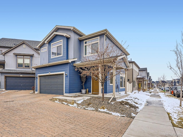 view of front of property featuring a garage