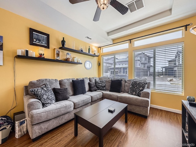 living room with ceiling fan and wood-type flooring