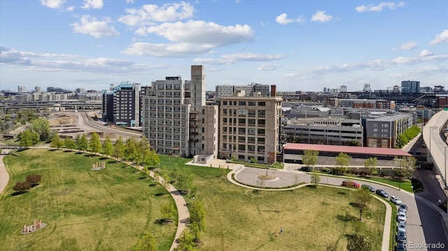 birds eye view of property with a view of city