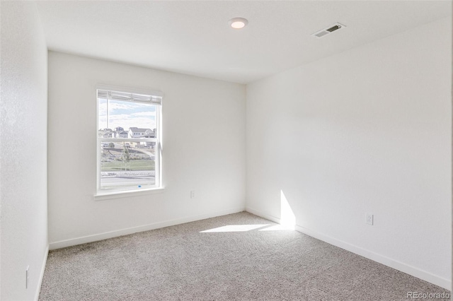 view of carpeted spare room