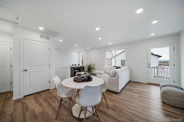 dining room featuring light hardwood / wood-style floors