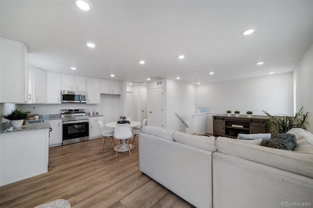 living room with light wood-type flooring