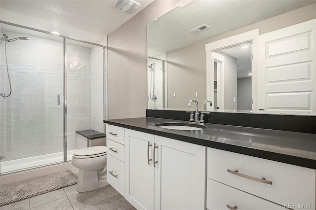 10179 E 59th N Pl, Denver, CO 80238 - full bath featuring toilet, a stall shower, tile patterned flooring, and vanity