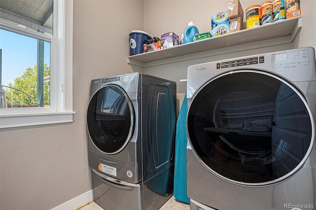 10179 E 59th N Pl, Denver, CO 80238 - washroom with independent washer and dryer and baseboards