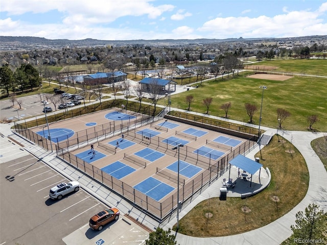 birds eye view of property featuring a mountain view