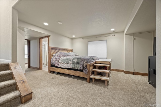 bedroom featuring recessed lighting, carpet, and baseboards