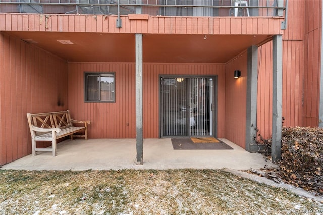 1625 W Elizabeth St Unit G2, Fort Collins, CO 80521 - view of exterior entry featuring a patio area