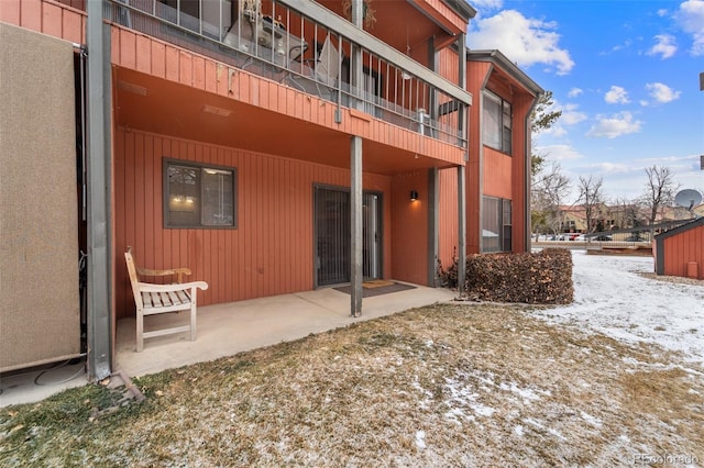 1625 W Elizabeth St Unit G2, Fort Collins, CO 80521 - view of snow covered rear of property