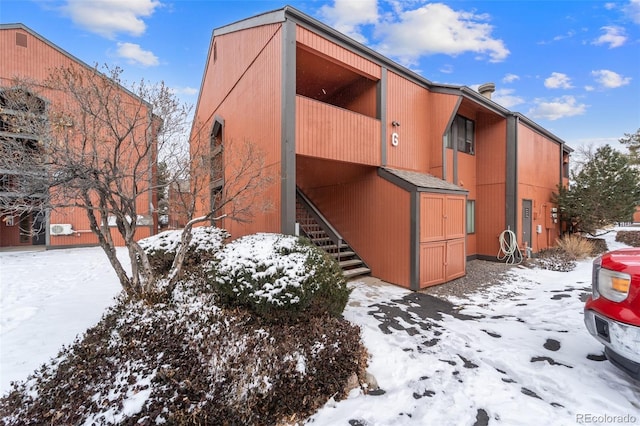 1625 W Elizabeth St Unit G2, Fort Collins, CO 80521 - snow covered building featuring stairs
