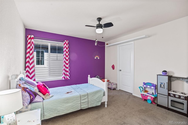 carpeted bedroom featuring a ceiling fan