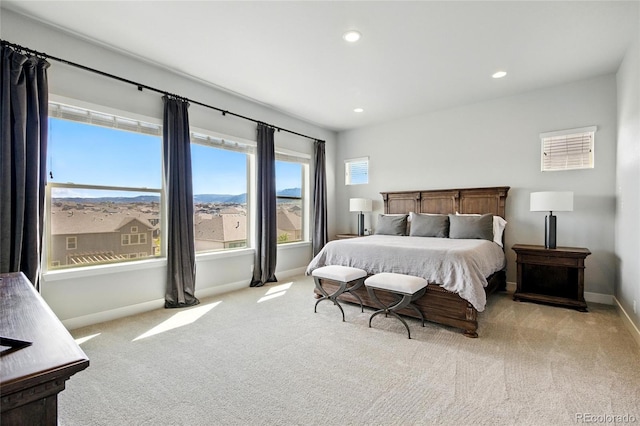 18212 W 95th Pl, Arvada, CO 80007 - bedroom featuring light carpet, baseboards, and recessed lighting