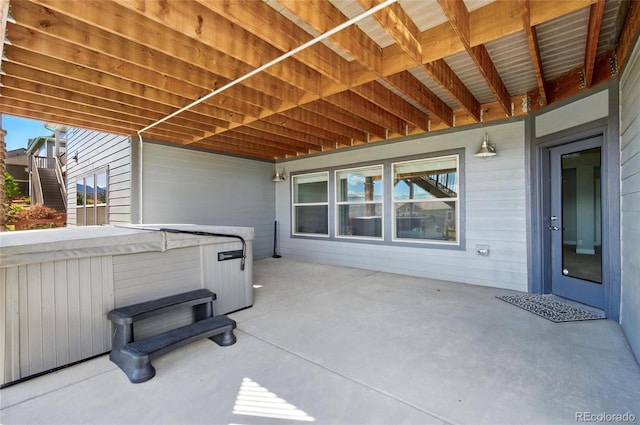 18212 W 95th Pl, Arvada, CO 80007 - view of patio with a hot tub