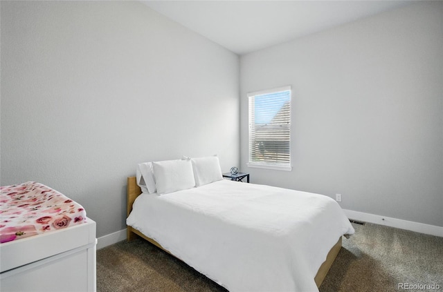 18212 W 95th Pl, Arvada, CO 80007 - carpeted bedroom featuring baseboards