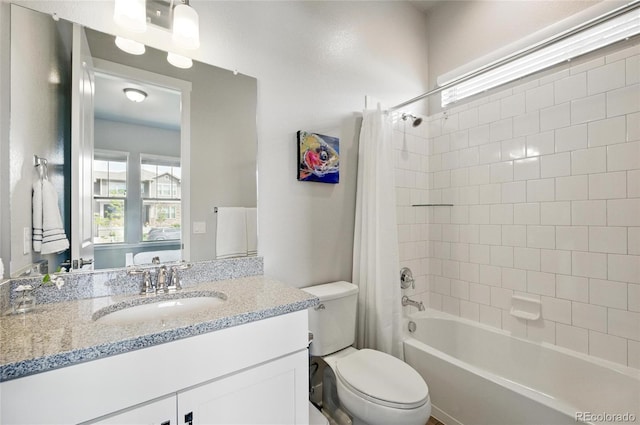 18212 W 95th Pl, Arvada, CO 80007 - bathroom featuring toilet, shower / bath combo, plenty of natural light, and vanity